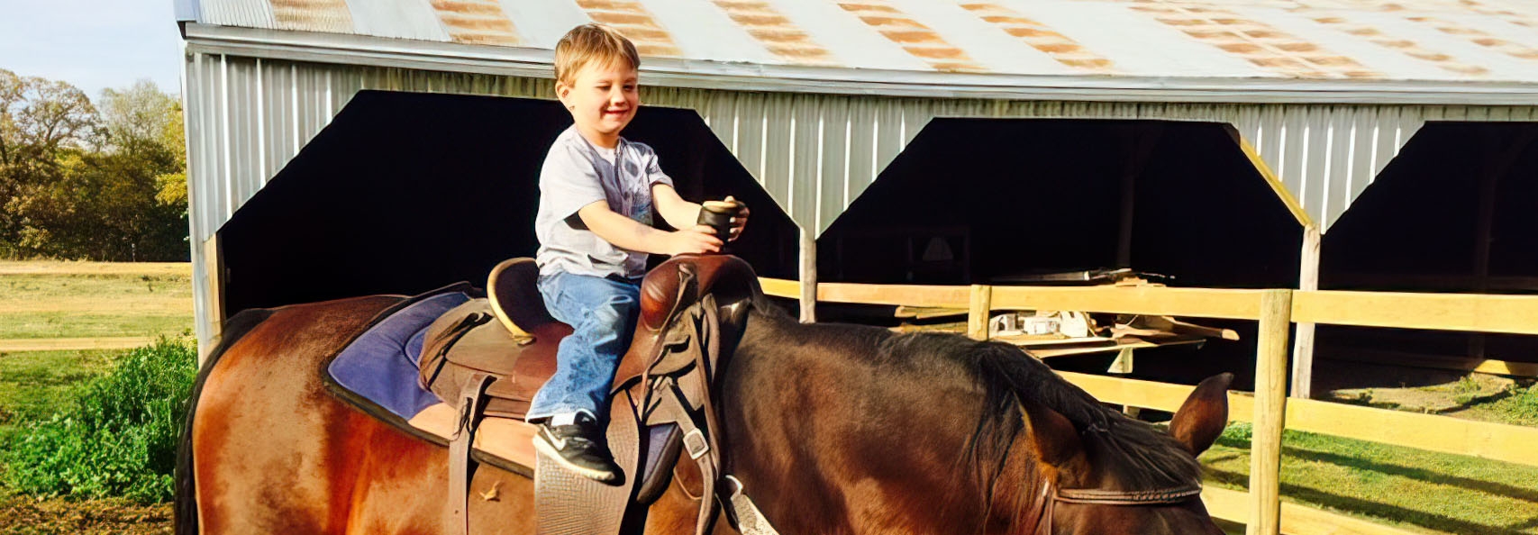 kid riding a horse